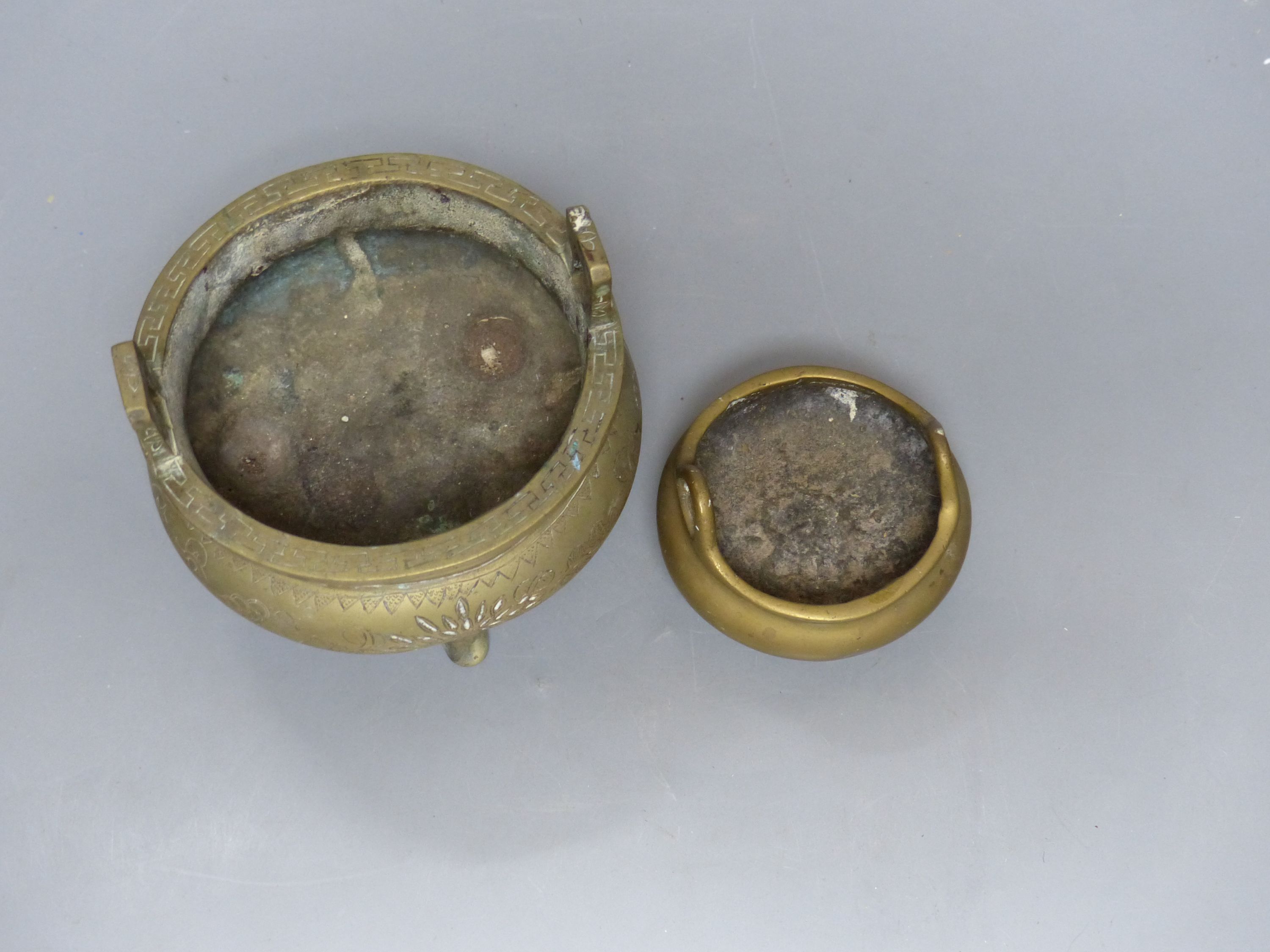 Two Chinese bronze tripod censers, Xuande marks, 19th/20th century, tallest overall 10cm